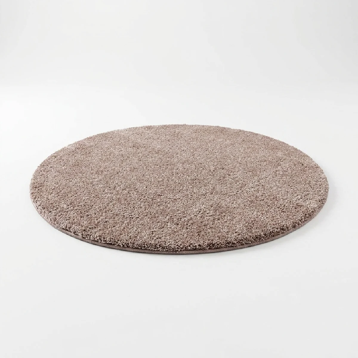 Runder Luxury Harmony schallabsorbierender Teppich in kaffeebrauner Farbe freigestellt vor weißem Hintergrund. Die dichte, gleichmäßige Bouclé-Oberfläche und die sauber eingefasste Kante sind gut sichtbar.